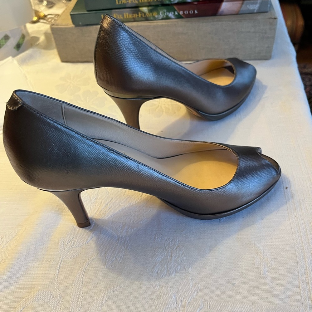 Lovely pair of Cole Haan Heels, size 7, with open toe and approx 3” heels
